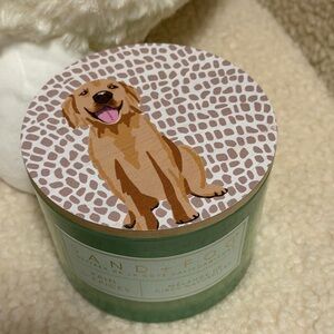 836. Sand and fog Dog-Themed Candle with Green and Brown Design